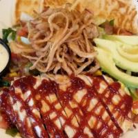 Southwest Bbq Salad · Mixed greens with avocado, bacon, tomato, cheddar cheese, Baja veggies, BBQ drizzled chicken...