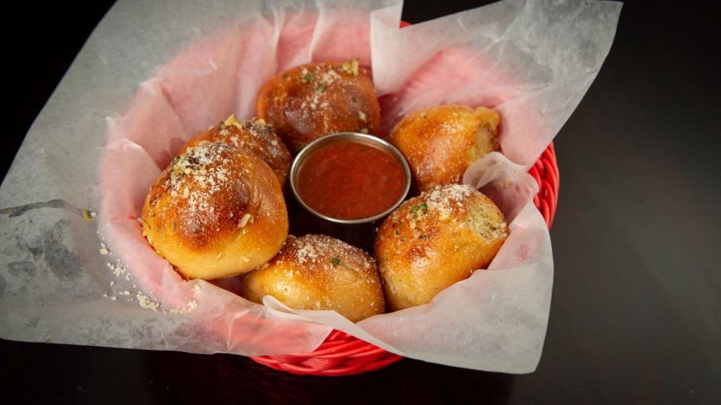 Garlic Knots · Olive Oil, Garlic, Parsley, Parmesan, Marinara