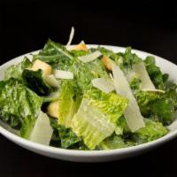 Side Caesar Salad · Romaine, Croutons, Shaved Parmesan, Caesar Dressing
