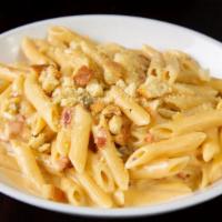 Spicy Bacon Mac & Cheese · Penne, Three Cheese Sauce, Jalapeño, Bacon, Herbed Breadcrumbs