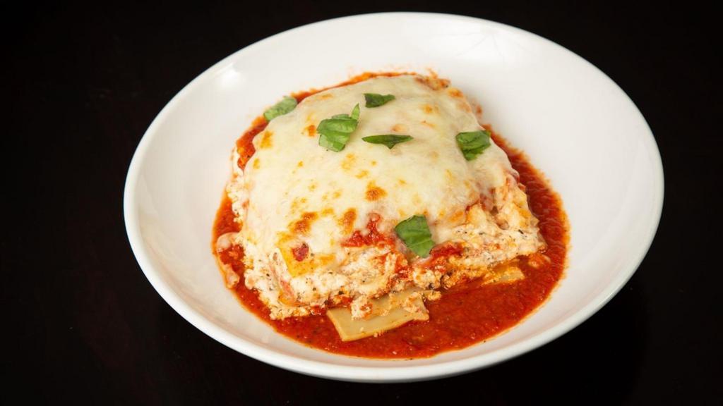 Lasagna · Ricotta, Mozzarella, Parm Reggiano, Marinara, Lasagna Noodles. Choice of Sauce: Marinara, Three Meat Bolognese, Alfredo, Spicy Marinara