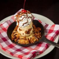 Cookie Skillet · Cookie, Vanilla Ice Cream, Chocolate Sauce, Caramel Sauce, Candied Nuts, Whipped Cream, Cherry