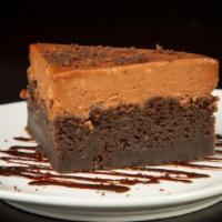 Chocolate Cake · Chocolate Layers, Whipped Peanut Butter Frosting, Chocolate Sauce