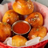 Vegan Garlic Knots · Olive Oil, Garlic, Parsley, Vegan Parmesan, Marinara