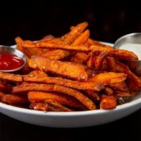 Vegan Sweet Potato Fries · Ketchup, Ranch, Choice of Flavor: Regular, Garlic Rosemary, Cajun, Old Bay, Lemon Pepper