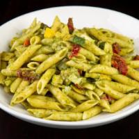 Vegan Garden Pesto Penne · Penne, Pesto, Sun Dried Tomatoes, Squash & Zucchini Mix, Artichoke