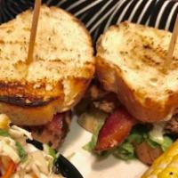 Chicken Club Sandwich Lunch · Wood-grilled chicken breast, bacon, fresh avocado, lettuce, tomato, onion, and garlic aioli....