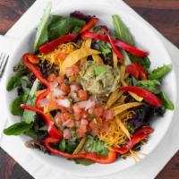 Que Cabron Taco Salad · Organic greens, spicy seasoned ground beef shredded cheddar, sliced red bell peppers, guacam...