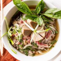 Special Pho (Phở Đặc Biệt) · Angus Eye Round steak, Brisket, Soft tendon, Tripe and Meatball.
