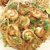 Pad Thai · Rice noodle stir-fried with bean sprouts, seasonal vegetables and eggs in a spicy tamarind s...