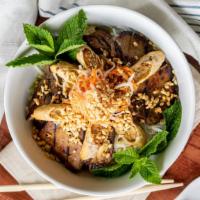 Vermicelli Bowl · Rice vermicelli with your choice of meat, served with fish sauce and bean sprout, cabbage, p...