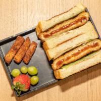Original Katsu Sando · Served with romaine lettuce and toasted fries. Thick-cut shoku-pan Japanese milk bread with ...