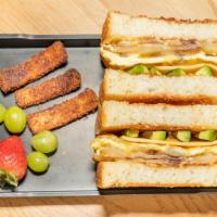 Supreme Katsu Sando · Egg, cheese, bacon, avocado, sauteed onions, and mushrooms. Thick-cut shoku-pan Japanese mil...