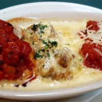 Meatball Sampler · Paolo's homemade meatballs with three sauces: marinara, gorgonzola and spicy.