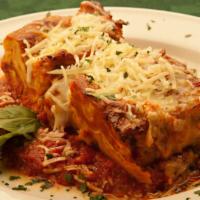 Lasagna · Five pasta layers with meat sauce, ricotta, mozzarella and parmesan cheeses.