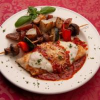 Chicken Parmigiana · Sauteed and baked with marinara sauce and mozzarella.