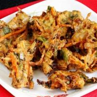 Vegetable Pakora · Crispy fried assorted fresh vegetables.