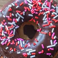 Chocolate Frosted Sprinkled White Ring Raised · Chocolate Frosted Sprinkle Ring