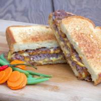 Patty Melt · Hand smashed cheeseburger, toasted white bread, mayo, mustard, caramelized onion.