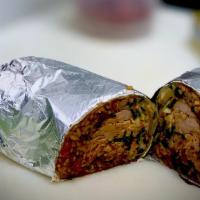 Qc'S Que-Rrito · An over stuffed burrito filled with Carolina red rice, baked beans and Red Hot Slaw with you...