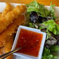 Thai Shrimp Tempura · Fried, crumb-breaded shrimp and mixed salad with sweet and sour sauce.