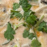 Tom-Kha Soup · Spicy and sour lemongrass soup with galangal root, kaffir leaves, mushroom, onion and coconut.