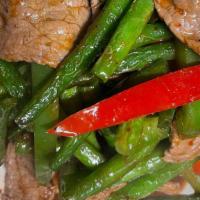Spicy Green Beans · Fresh green beans, bell peppers in spicy garlic, and ginger sauce.