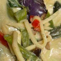 Green Curry · Eggplant, bamboo shoots, bell pepper, basil leaves in green curry.