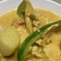 Yellow Curry · Potato, carrot, onion, bell pepper in coconut, and yellow curry.