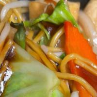 Thai Style Yakisoba Noodles · Egg noodles with bean sprouts, green onion, carrot, mushrooms, and green cabbage.