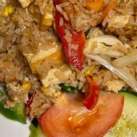 Thai Basil Fried Rice · Rice with choice of meat, egg, onions, bell pepper, mushroom, and basil.