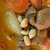 Stewed Lamb In Massaman Curry · Stewed style lamb cook with potato, carrot, onion & peanuts in Massman curry.
