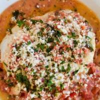 Huevos Ranchero · Two Eggs any Style, Refried Beans, Corn Tortillas, Ranchero Sauce