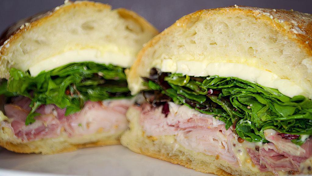 French · Ham, brie, mixed greens, house-made mustard, house made aioli.

NOTE: We CANNOT do sauce or items on the side, we don't do plastic togo containers. We can, however, leave it off or go lite for you.