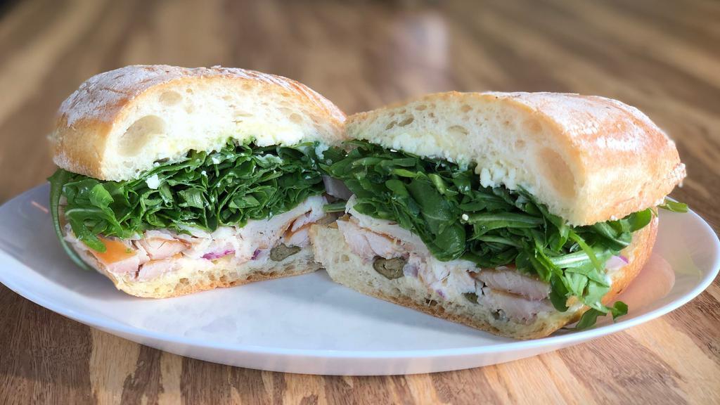 Fish · Smoked rainbow trout, house-made aioli, blue cheese, capers, red onion, arugula, olive oil, lemon juice.