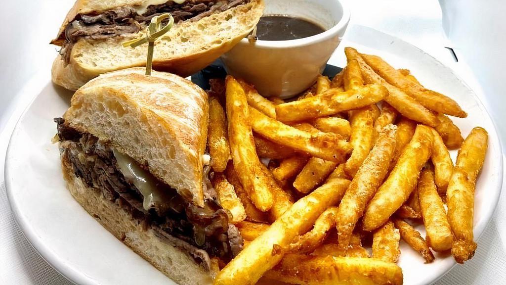 French Dip · Thinly Sliced Slow Roasted Beef, Swiss Cheese, Horseradish Mayo, on Ciabatta. Served with Au Jus.