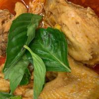 Cà Ri Gà - Homemade Free Range Chicken Curry. · Bone-in chicken stewed in an onion, bay leaves, and lemongrass based sauce, flavored with ga...