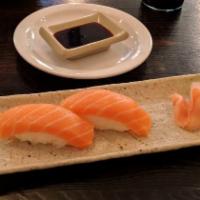 Salmon Nigiri (2) · The consumption of raw or under cooked food such as beef, eggs, fish, poultry, shellfish and...