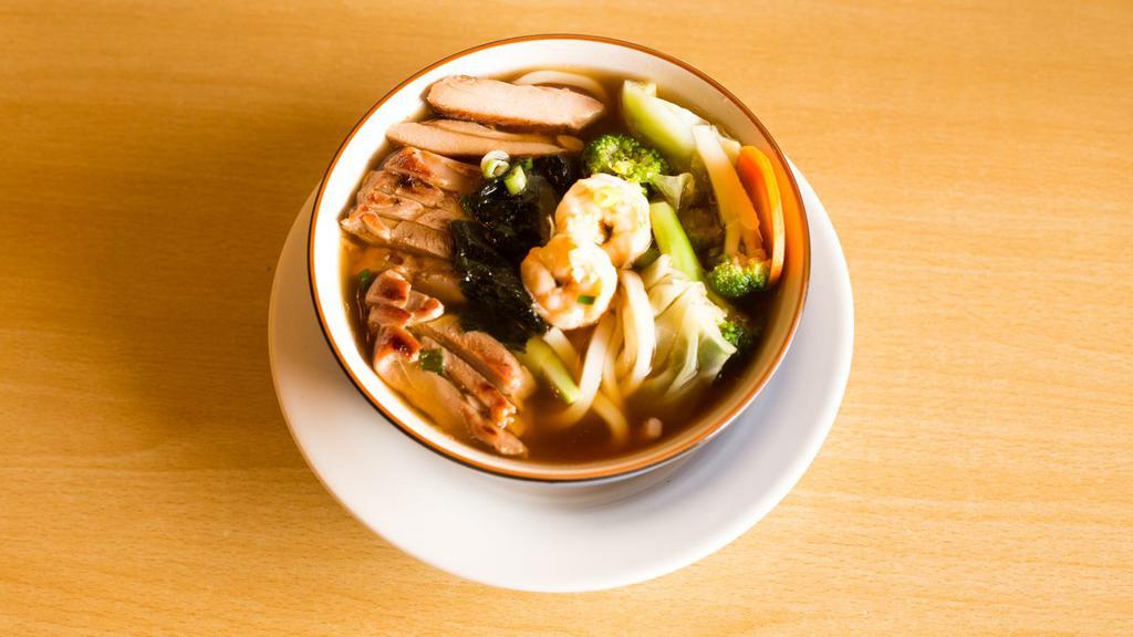 Udon · With broccoli, cabbage, carrots, seaweed, chicken, and shrimp.