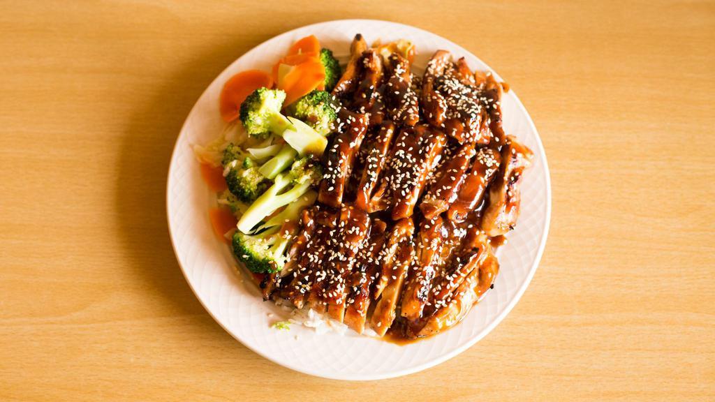 Teriyaki Chicken Plate · Served with Steam rice, veggies (Broccoli, cabbage, and carrots),  Teriyaki Chicken, sesame seeds, and teriyaki sauce