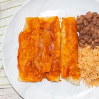 Cheese Enchiladas · 3 corn tortillas filled with cheeses topped with red sauce, lettuce and sour cream, rice and...