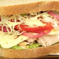 Baja Chipotle · Turkey, shaved cabbage, honey chipotle lime sauce, pickled red onions, pepper jack cheese, a...