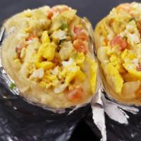 Breakfast Burrito · A  big burrito with your choice of meat, all burritos come with eggs, and cheese on a 14 in ...