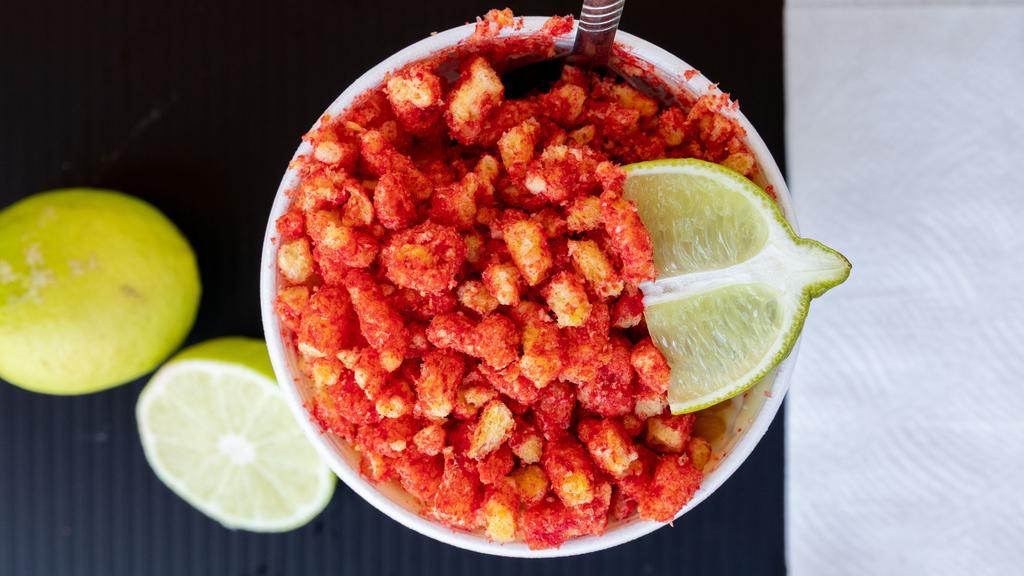 Hot Cheeto Esquites · Corn with mayo, cotija cheese, chili powder & hot cheeto dust served in a cup