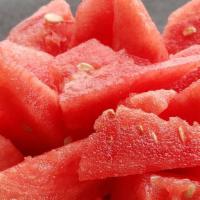 Watermelon Bowl · Watermelon bowl topped with chamoy, tajin, & lime