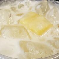 Pina Colada Agua Fresca · fresh coconut cream syrup mixed with our housemade pineapple agua fresca, and fresh chunks o...