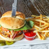 Half Pound Burger · Lettuce, mayo, and tomato with fries.