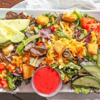 House Salad · Crisp lettuce mix served with cucumbers, tomatoes, carrots, celery, cheese & croutons. Itali...
