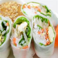 Fresh Salad Roll: · Rice paper wrapped w/ mixed vegetables, sweet basil, mint, 
cilantro, and tofu, served w/ pe...