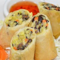 Spring Roll: · Golden fried rice paper wrapped w/ mixed vegetables and glass noodles, served w/ homemade pl...